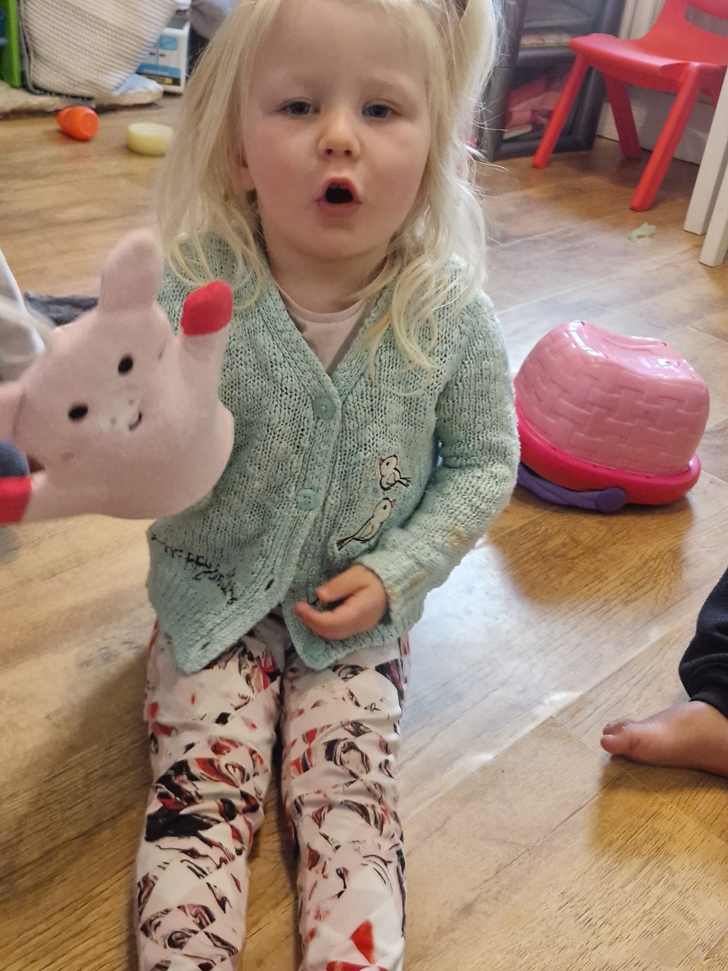 Children practicing new skills with caring support.