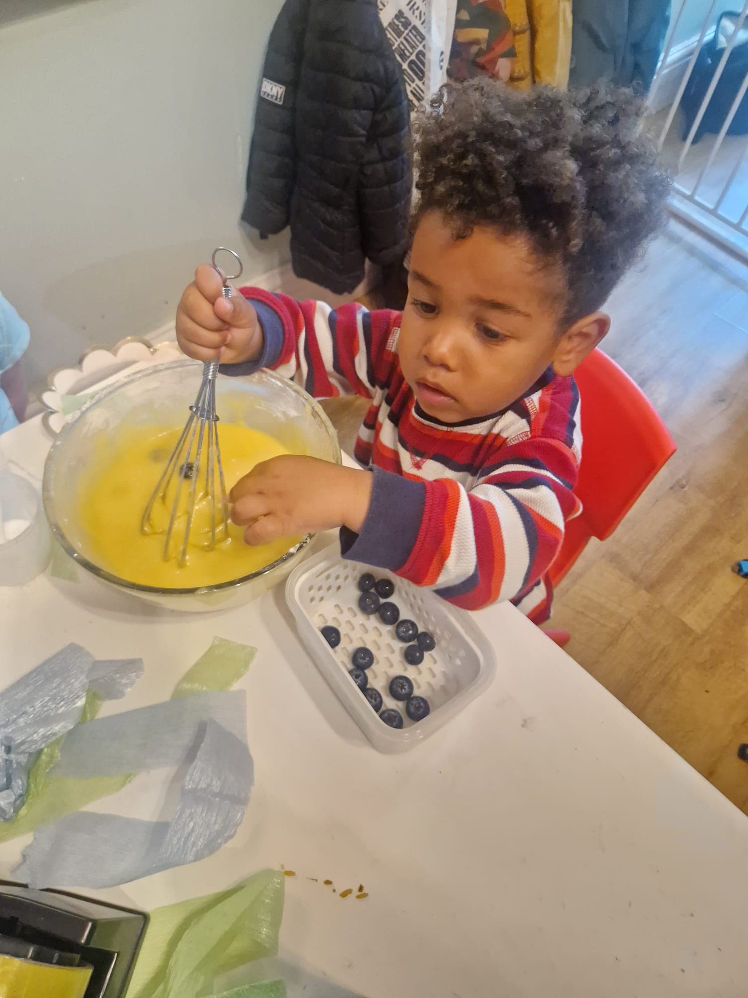 Children exploring hands-on creative activities.