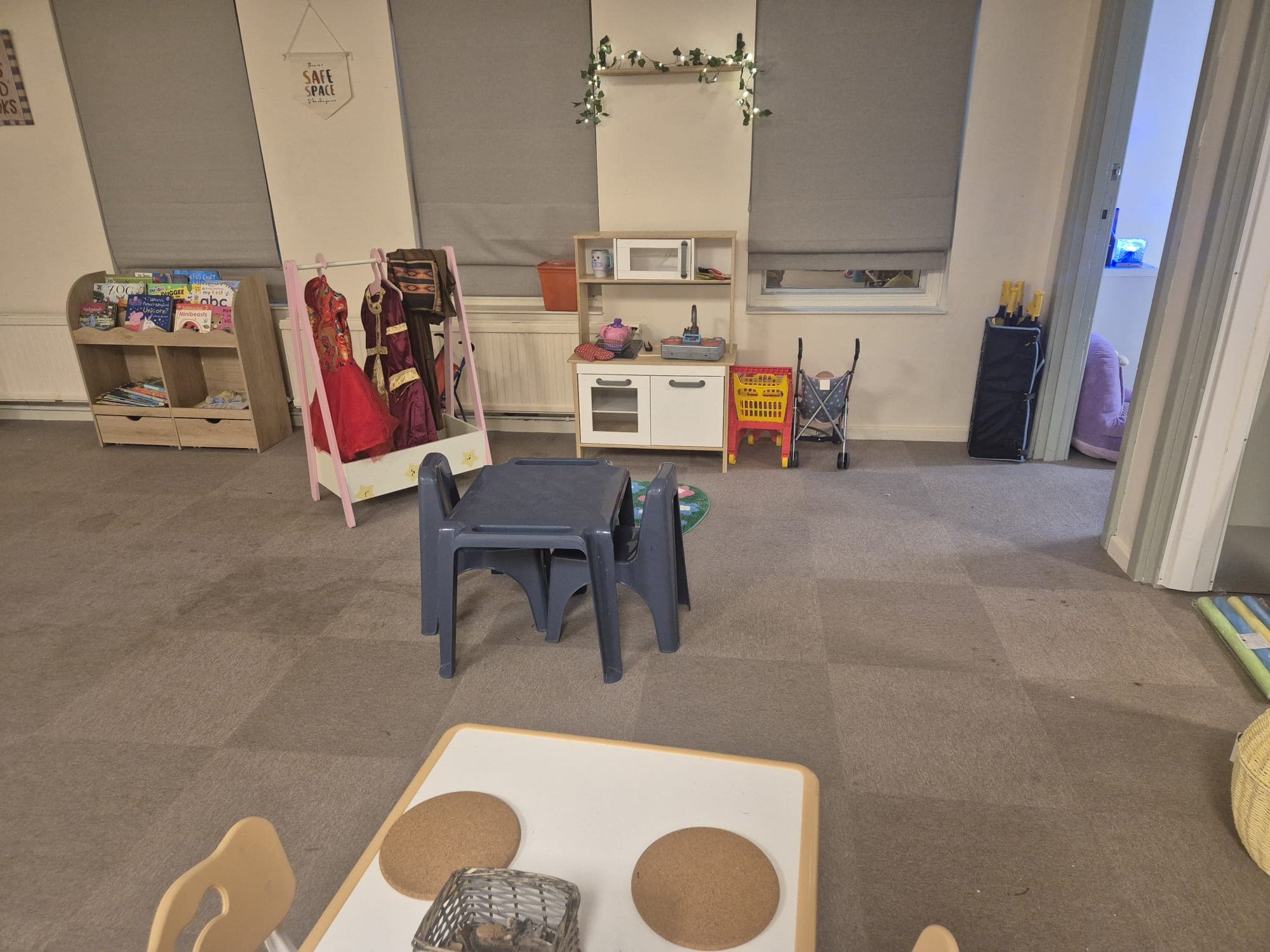 A wide view of the main play and activity room at Daisy Rose Daycare, Caversham.
